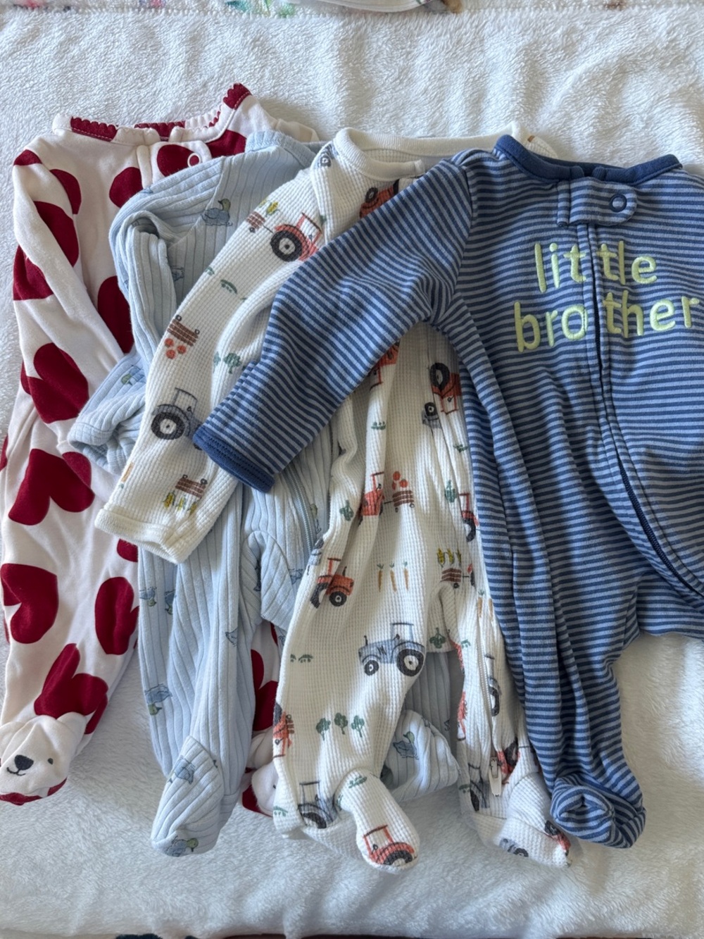 Carter's Newborn Footed One-Piece 4 pack